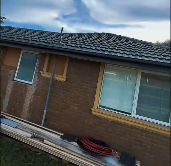After: a tiled roof in Clayton: the tiles before, and the house from the street after