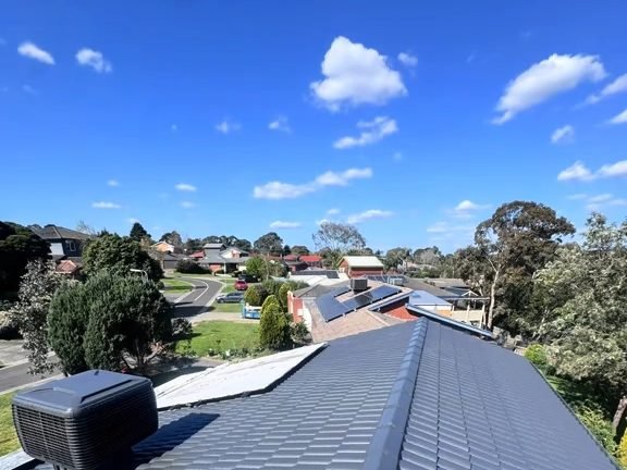 The same roof restored, from the other side of the ridge